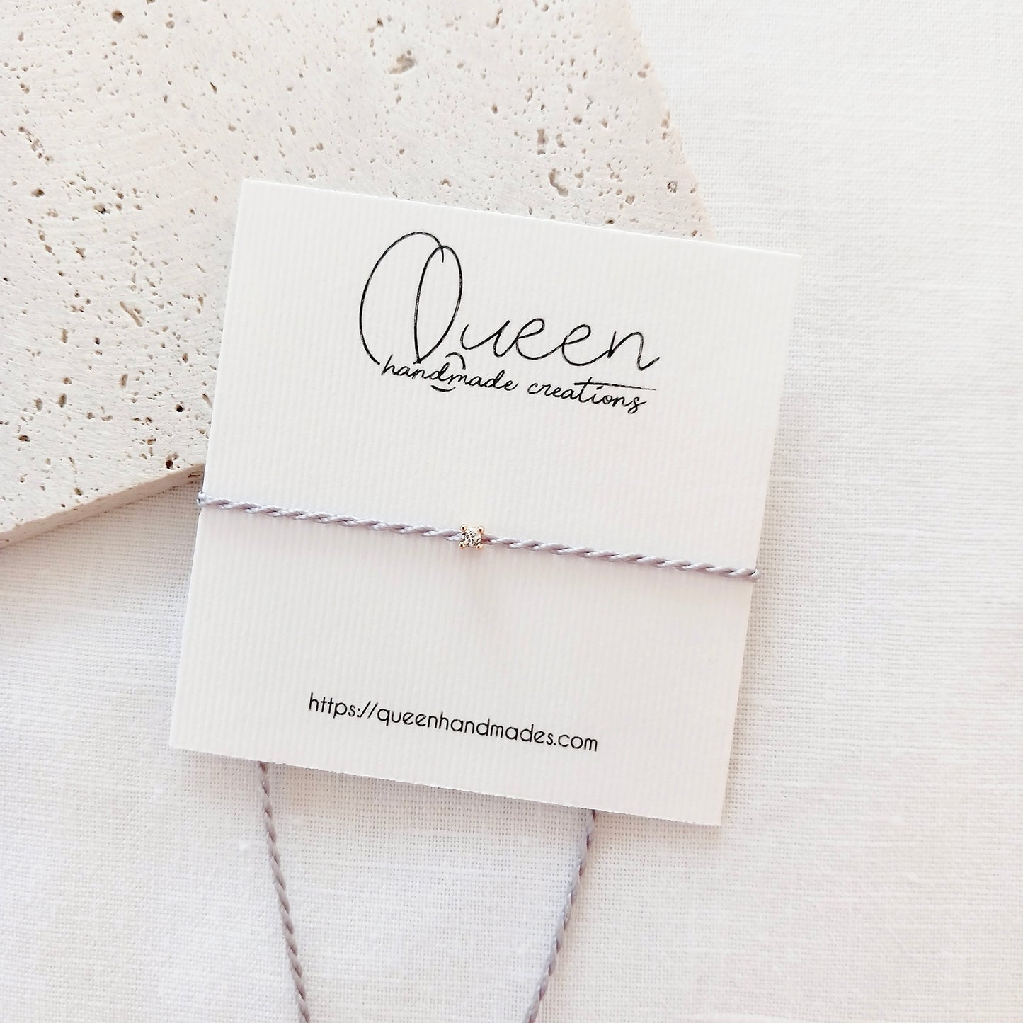 Delicate gold zirconia string bracelet