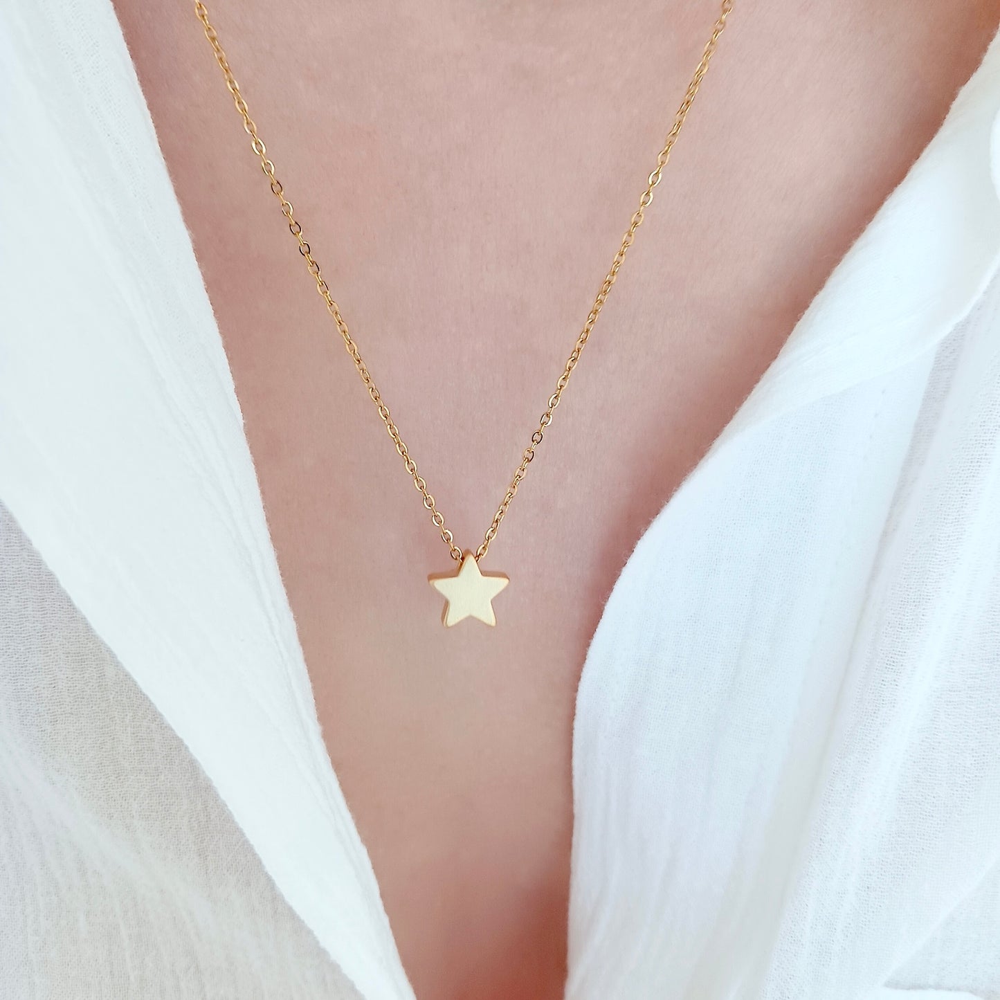 Gold star necklace
