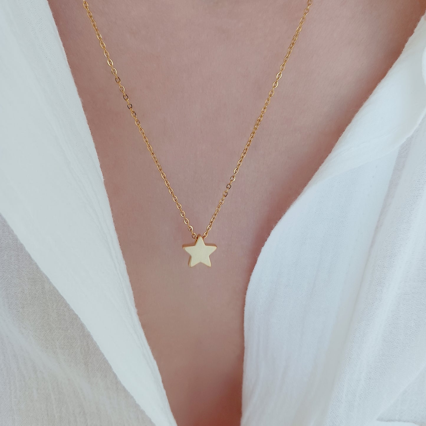 Gold star necklace