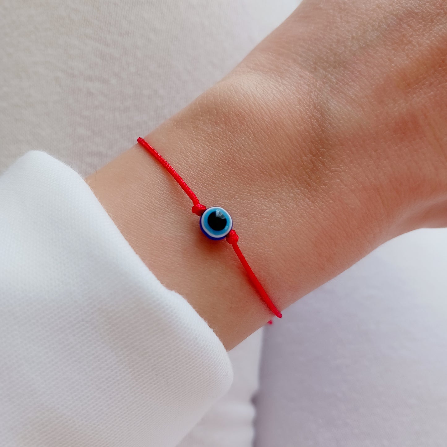Evil eye bracelet with red cord, set of 5