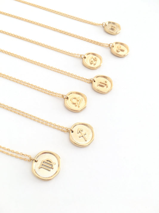 Gold zodiac necklace