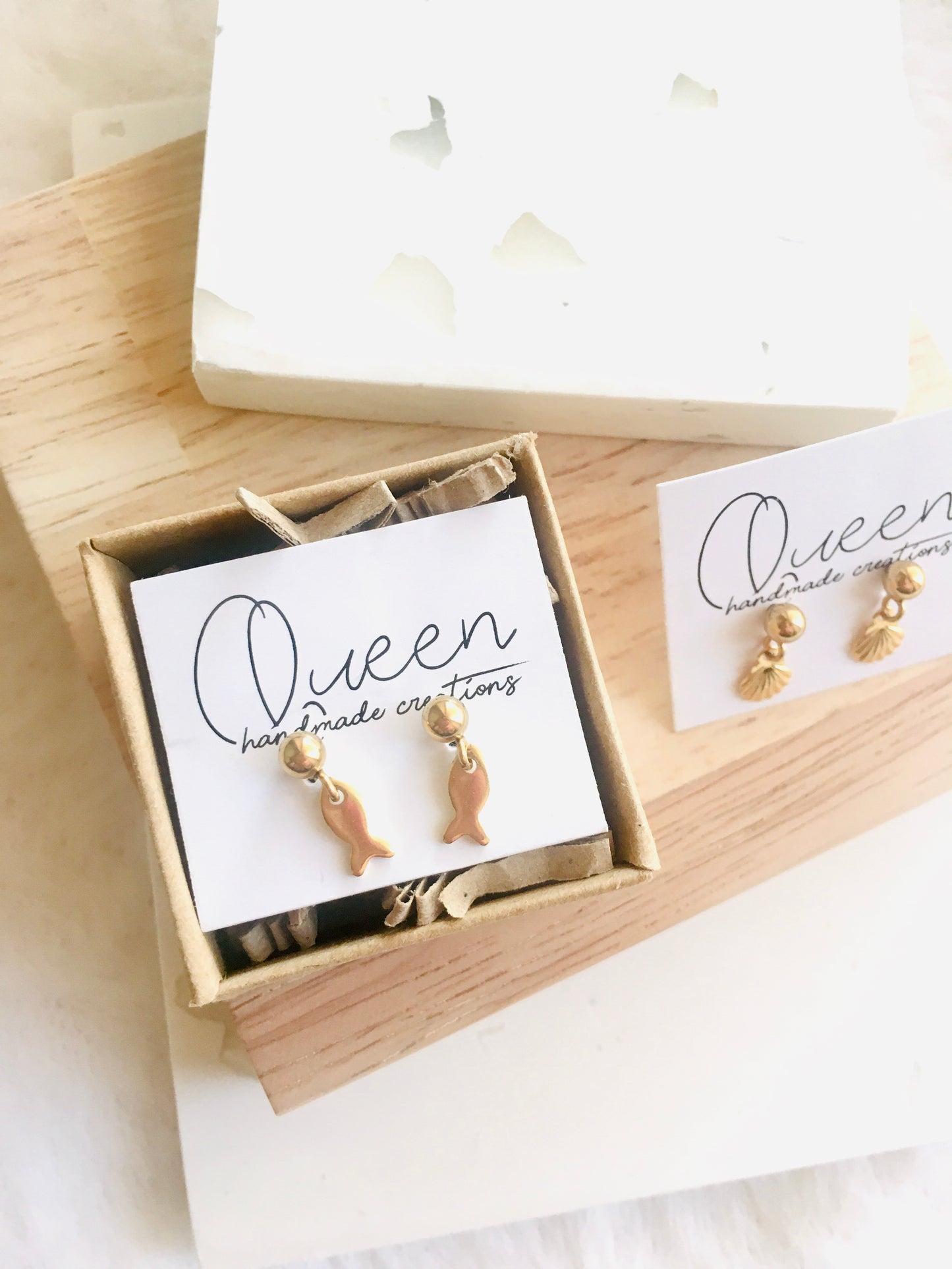 Tiny gold earrings