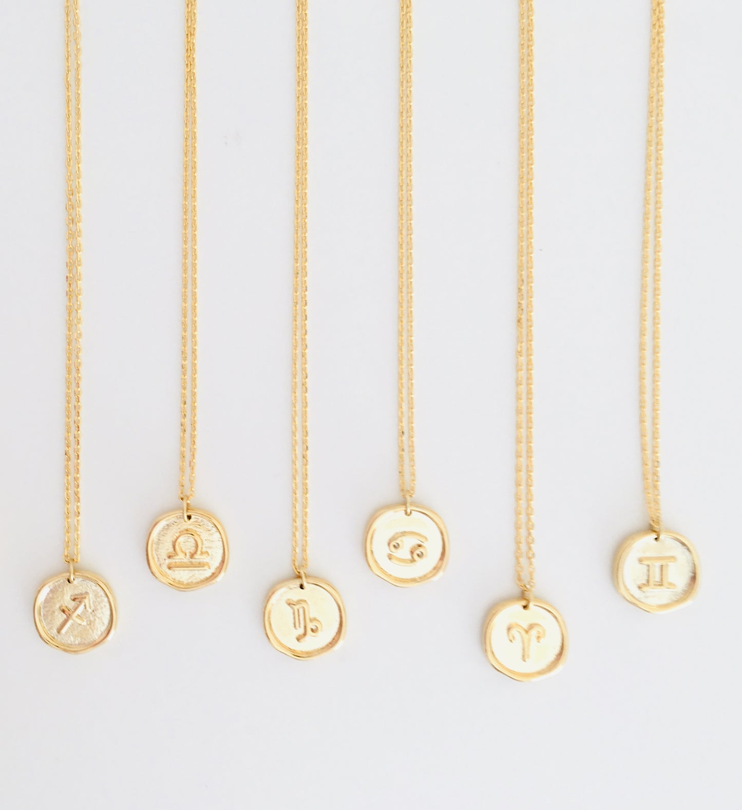 Gold zodiac necklace