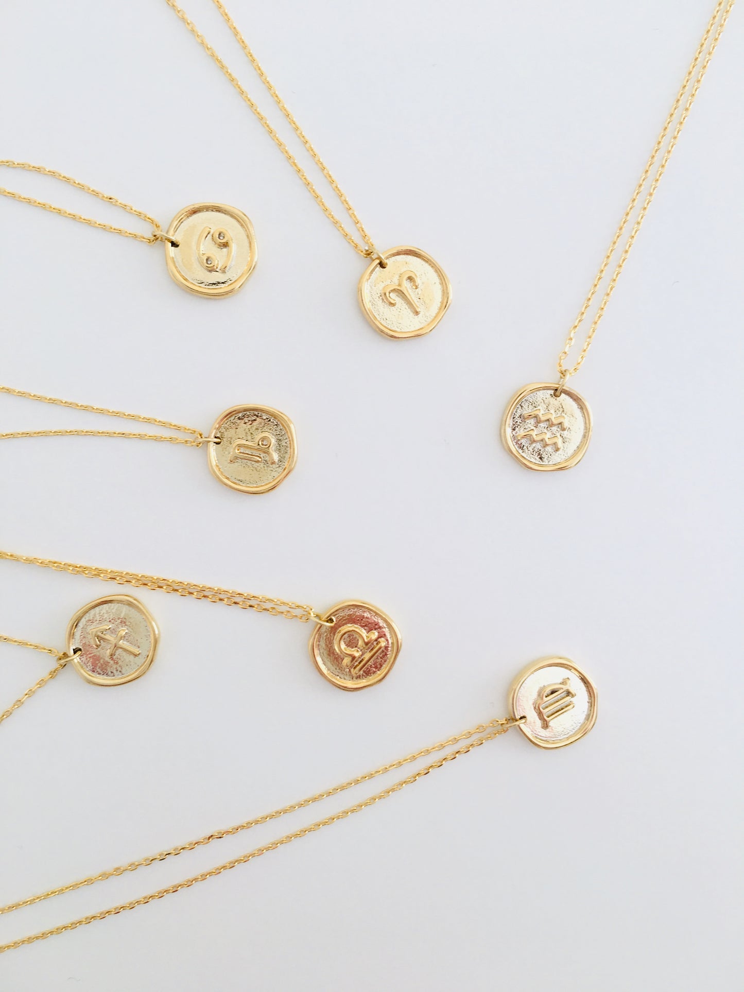 Gold zodiac necklace