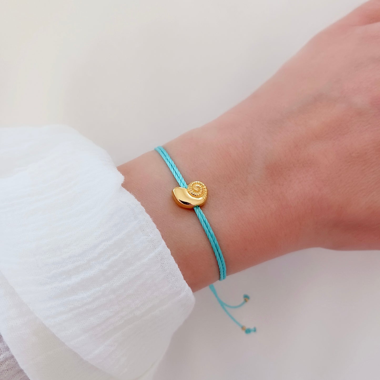 Gold Shell Charm Cord Bracelet