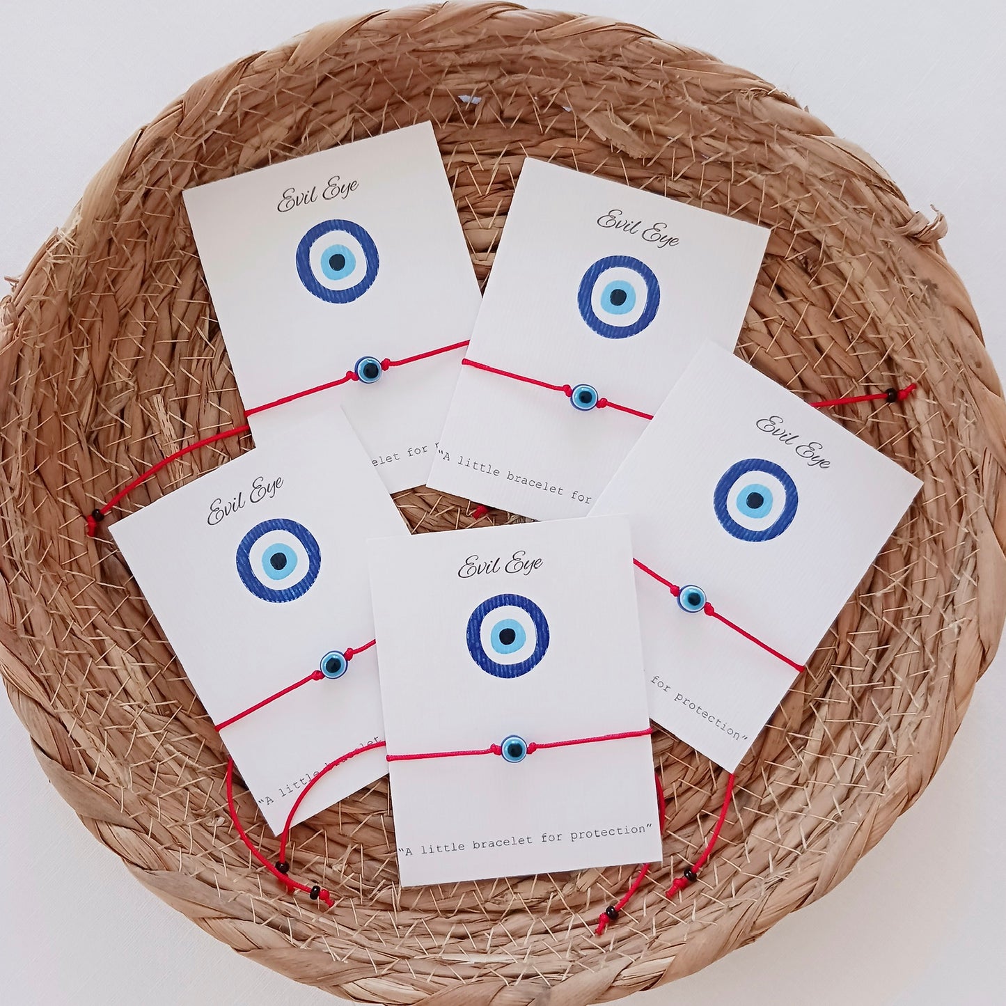 Evil eye bracelet with red cord, set of 5
