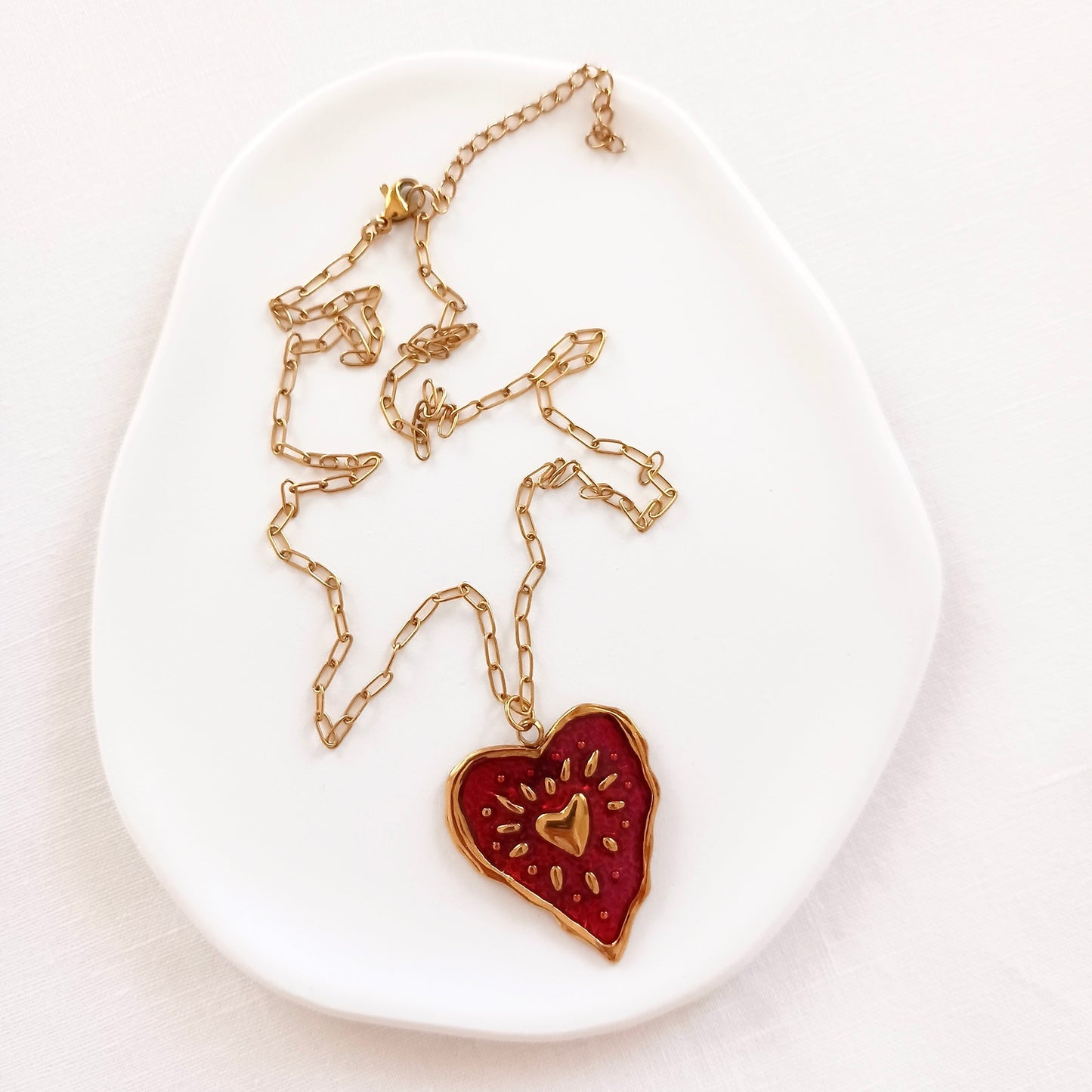 Red enamel heart necklace in stainless steel