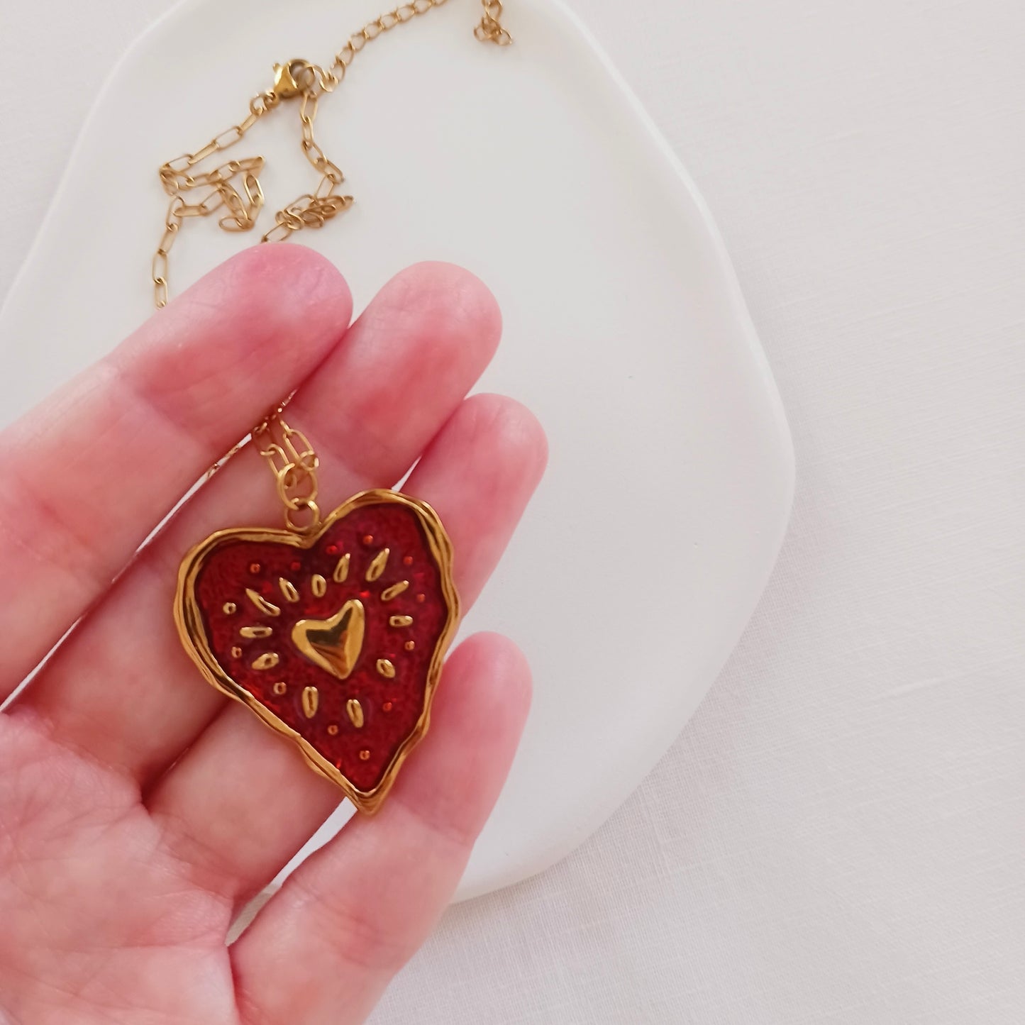 Red enamel heart necklace in stainless steel