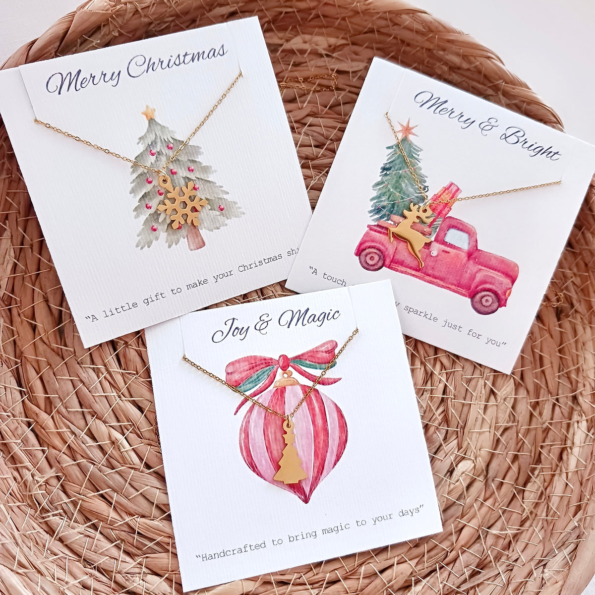 Stainless steel christmas tree chain necklace on holiday message card
