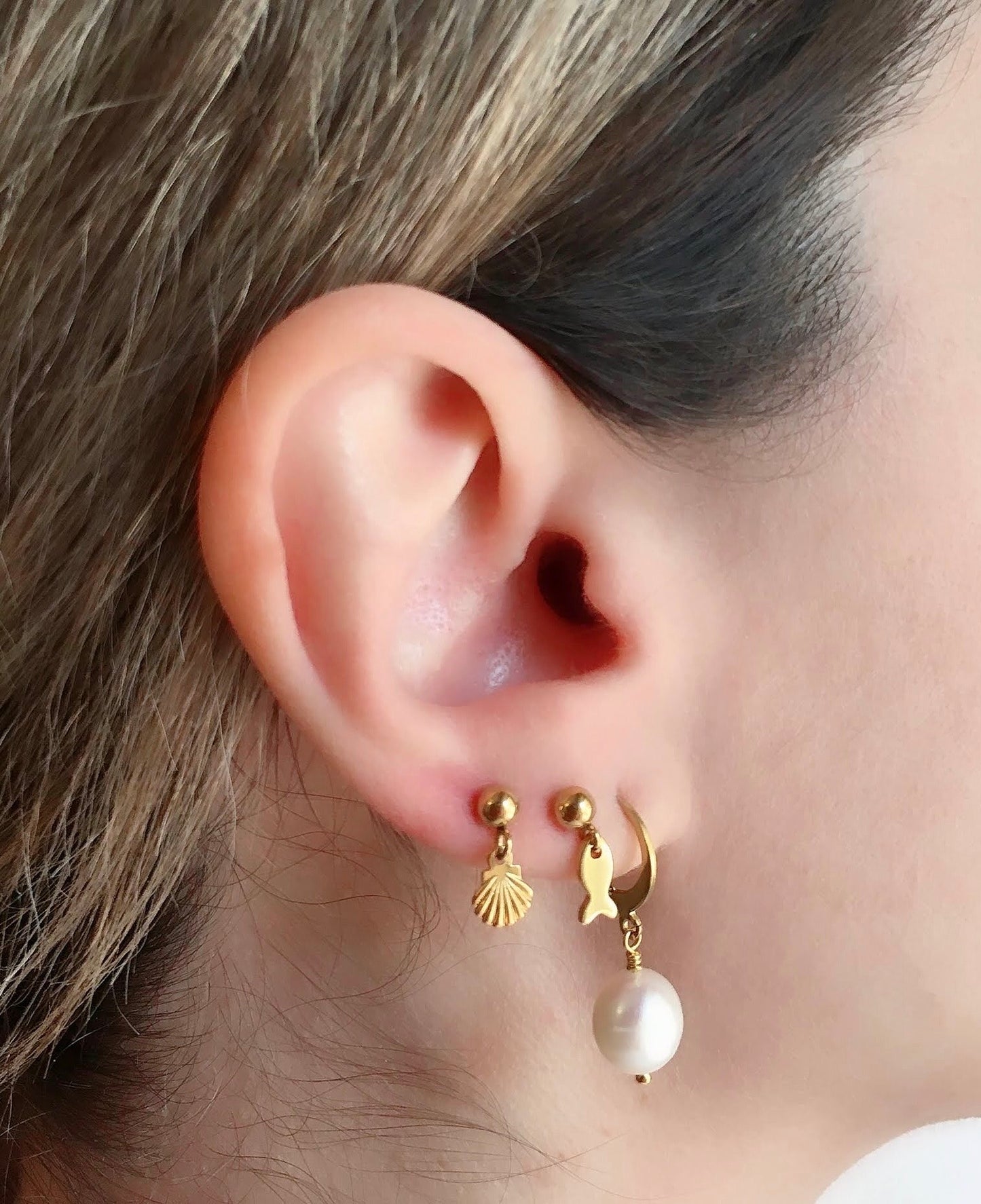 Tiny gold earrings