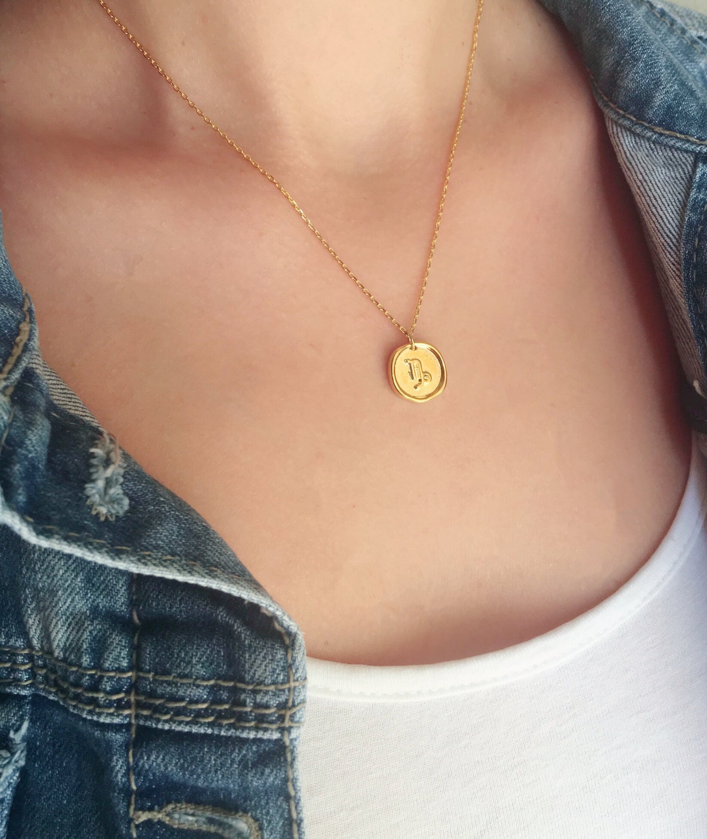 Gold zodiac necklace