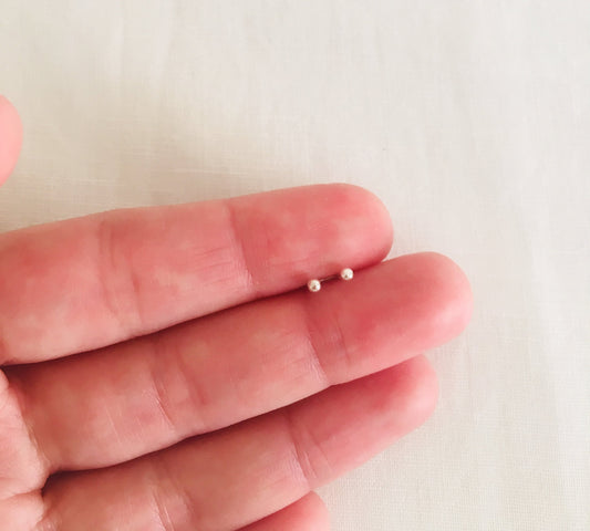 Tiny silver stud earring